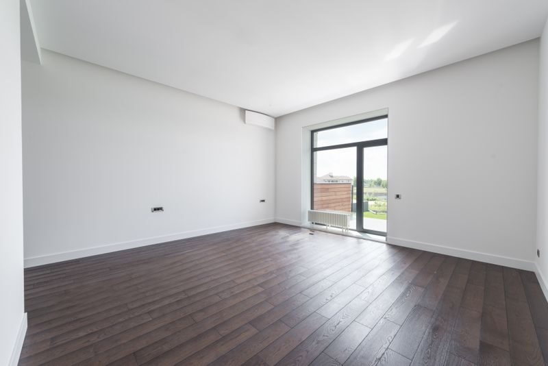 Empty, freshly cleaned apartment room ready for move-in